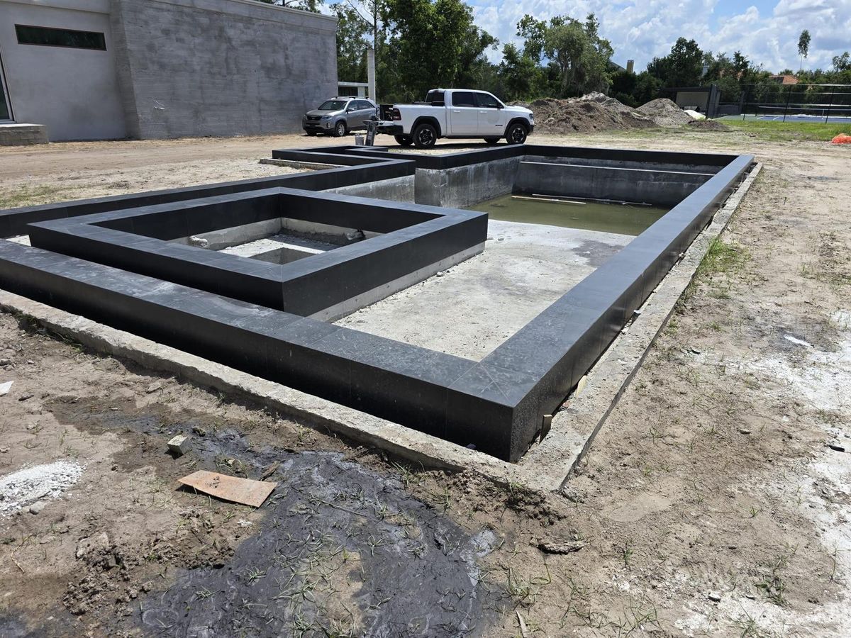 Dark porcelain pool tile installation in Orlando, FL