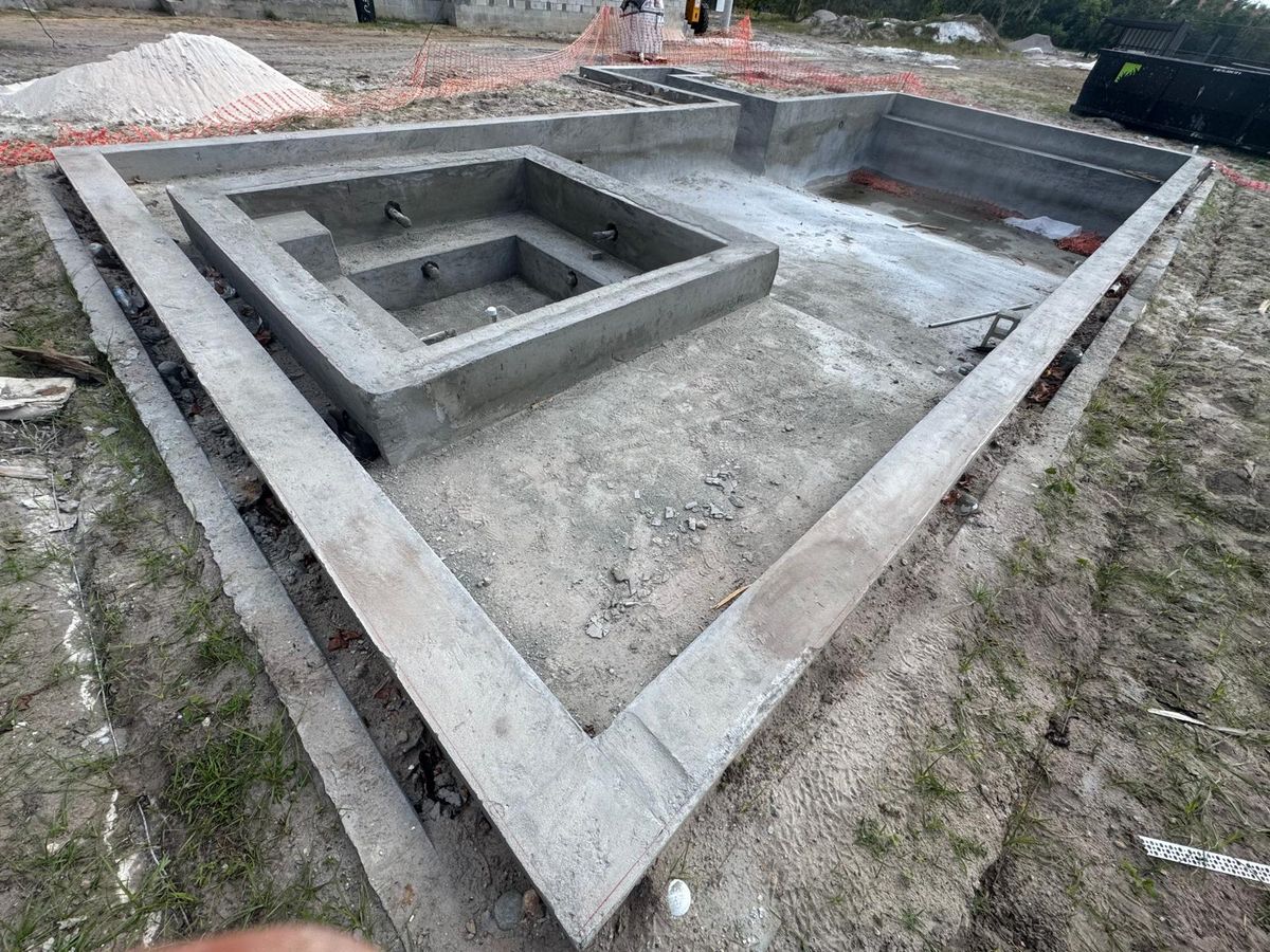 Luxury Dark Porcelain Pool & Spa - Photo 2 - Pool Remodeling in Orlando, FL