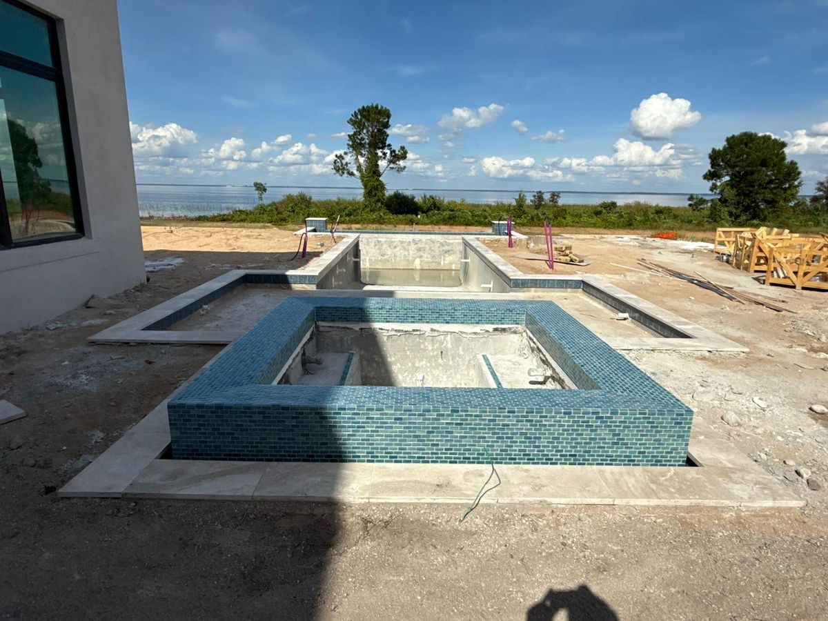 Glass Mosaic Spa & Travertine Coping - Spa & Hot Tub Tile in Orlando, FL