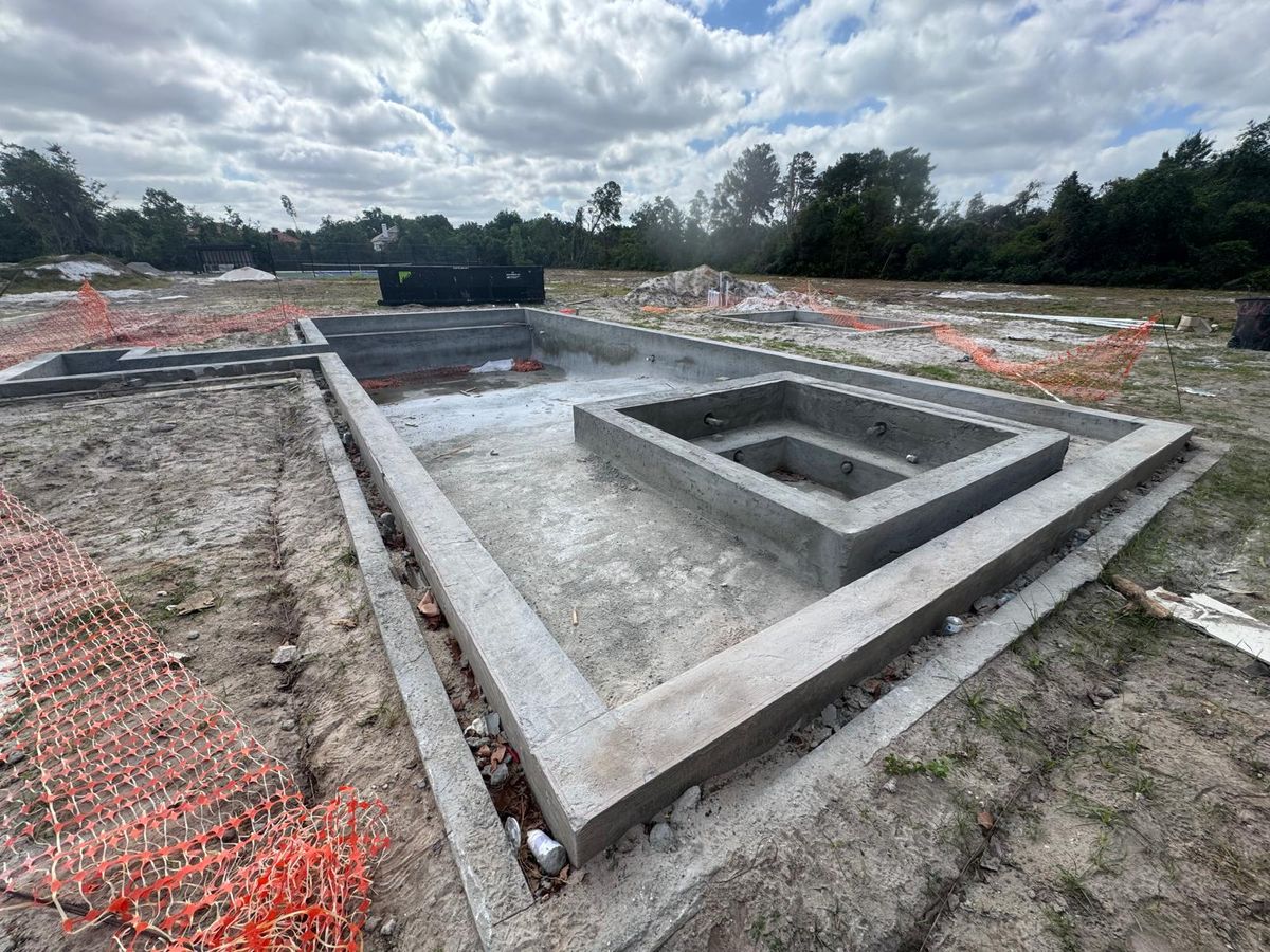 Luxury Dark Porcelain Pool & Spa - Photo 1 - Pool Remodeling in Orlando, FL