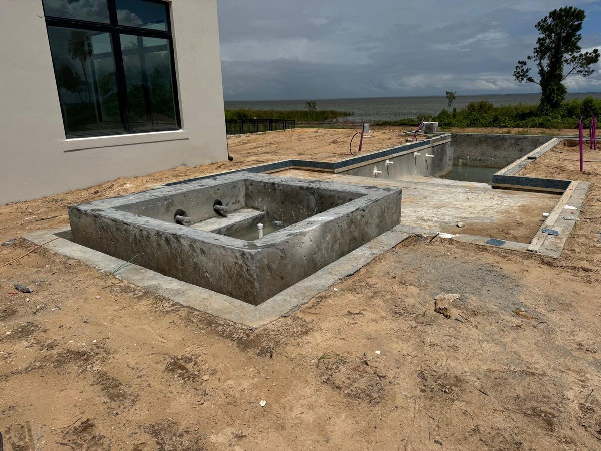 Glass Mosaic Spa & Travertine Coping - Photo 1 - Spa & Hot Tub Tile in Orlando, FL
