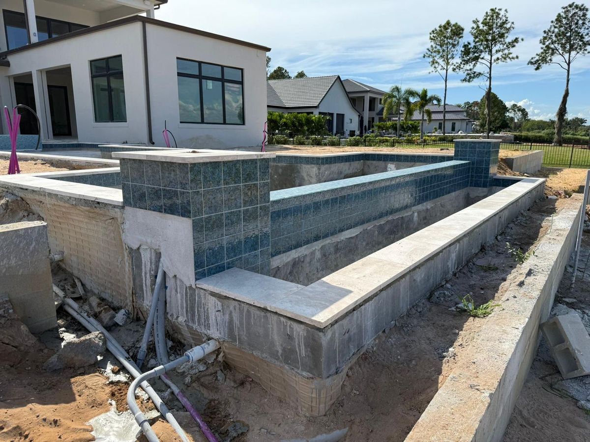 Glass Mosaic Spa & Travertine Coping - Photo 3 - Spa & Hot Tub Tile in Orlando, FL